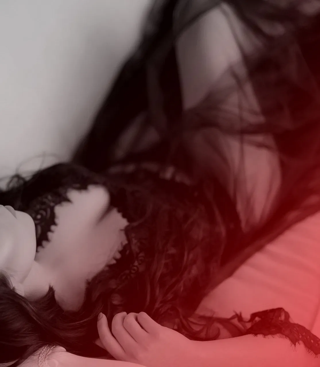 Candlelit massage room at Enigma Touch London — private erotic massage studio